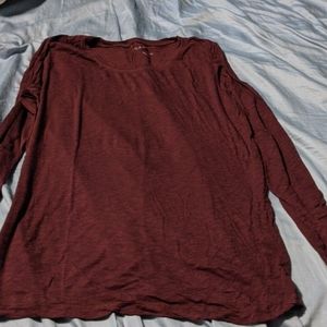 Long sleeve burgundy thin material t-shirt.